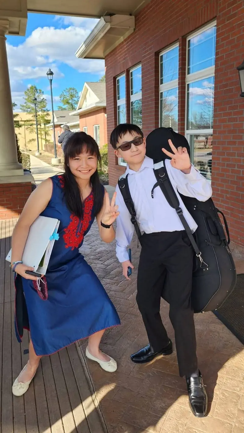 Noah and Acelynn arriving for a senior community music performance.